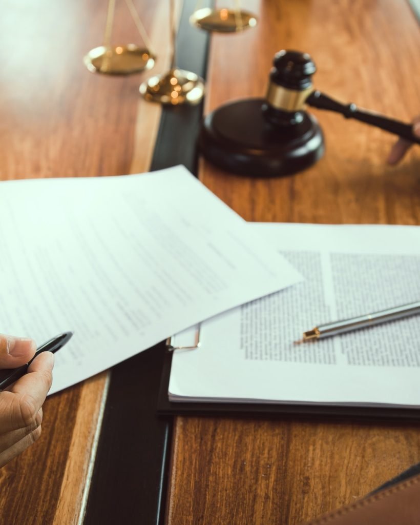 client-is-bringing-the-documents-to-clarify-the-law-to-the-lawyer-at-the-prosecutor-office-.jpg